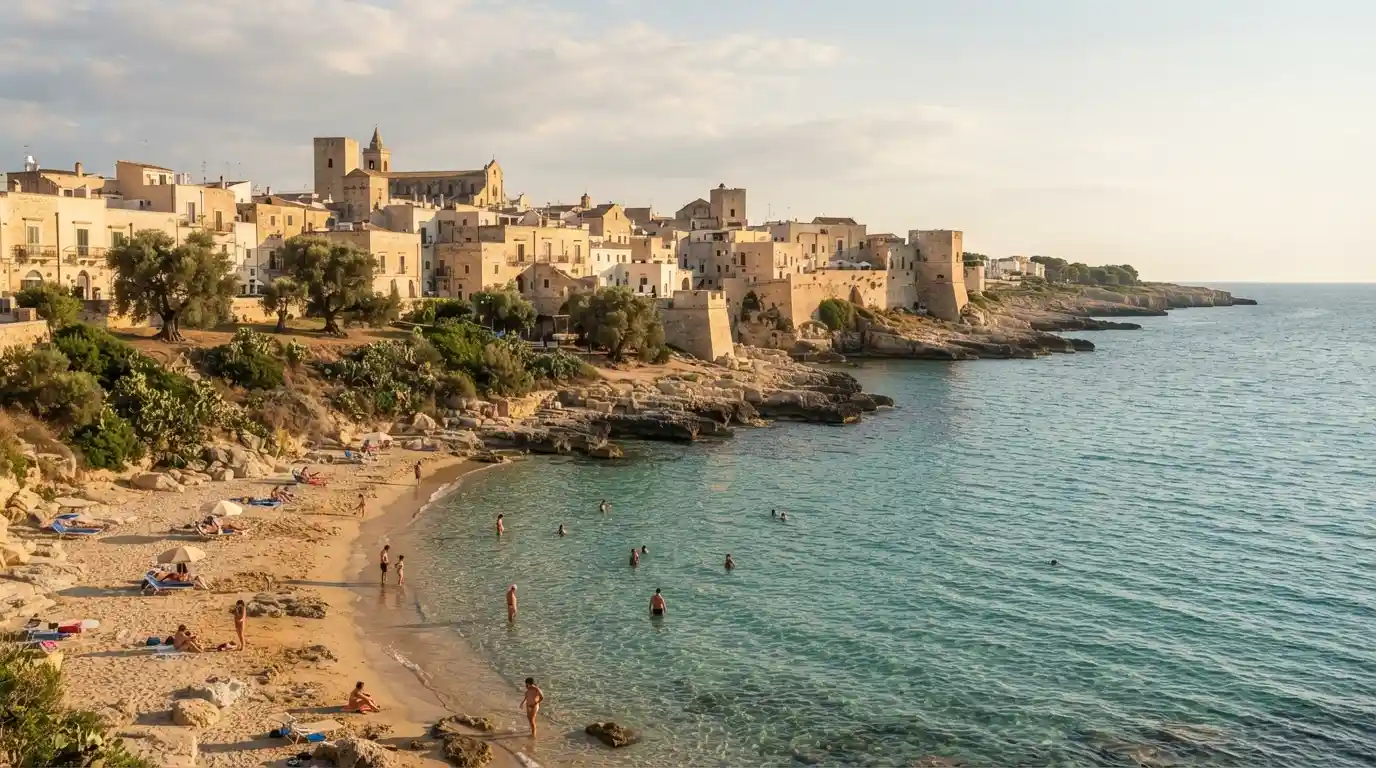 Scenic Salento coastline with a sandy Mediterranean beach and traditional Italian architecture